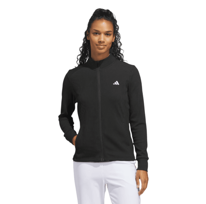 CAMPERA PERFORMANCE TEXTURIZADA CIERRE FRONTAL
